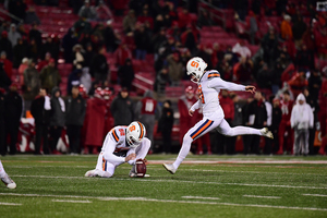 Andre Szmyt kicks a field goal during Syracuse-Louisville last year. He's three makes away from tying Syracuse's all-time field goal record. 